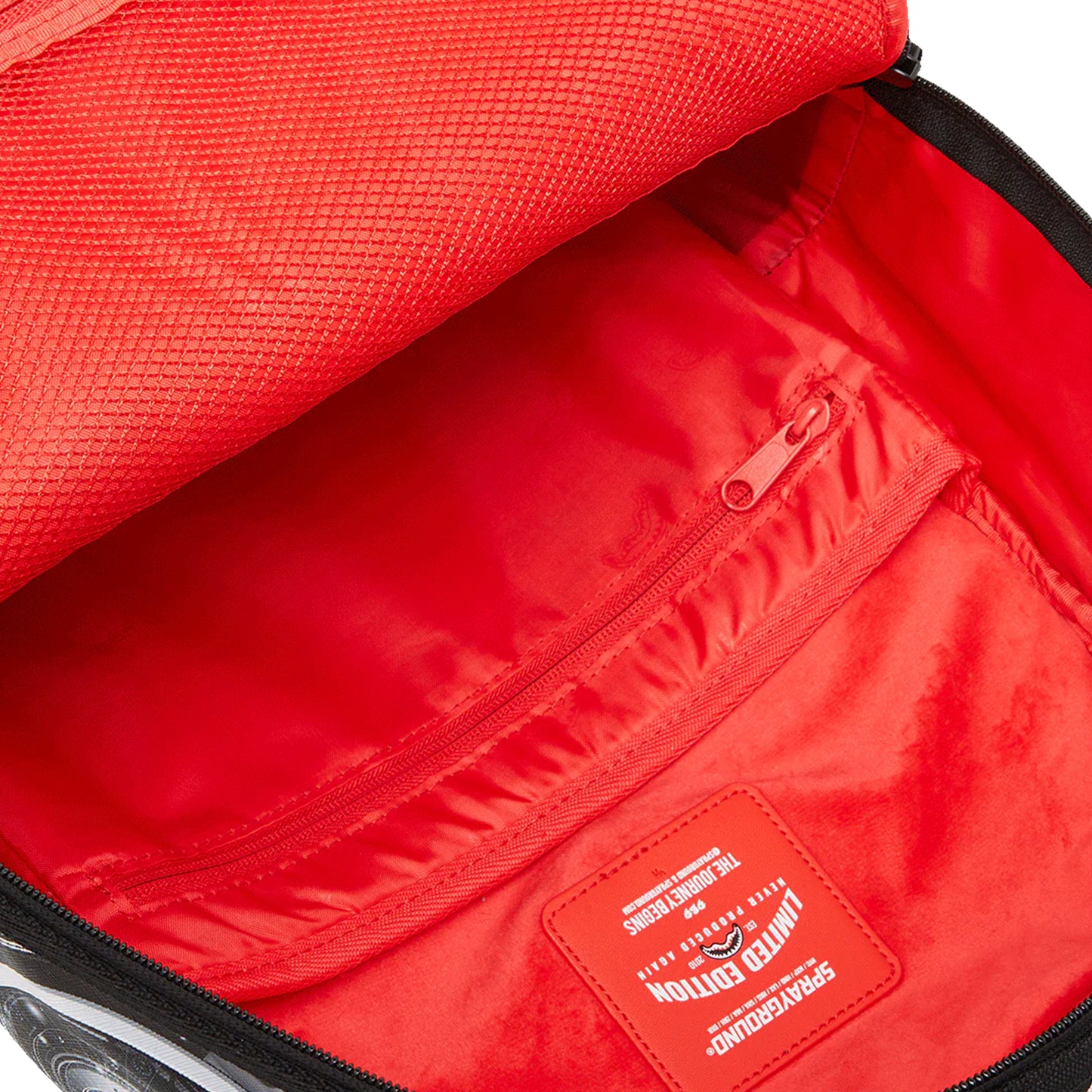 Mochila Urbano Unisex Sprayground Dlxsv Split Cybershark